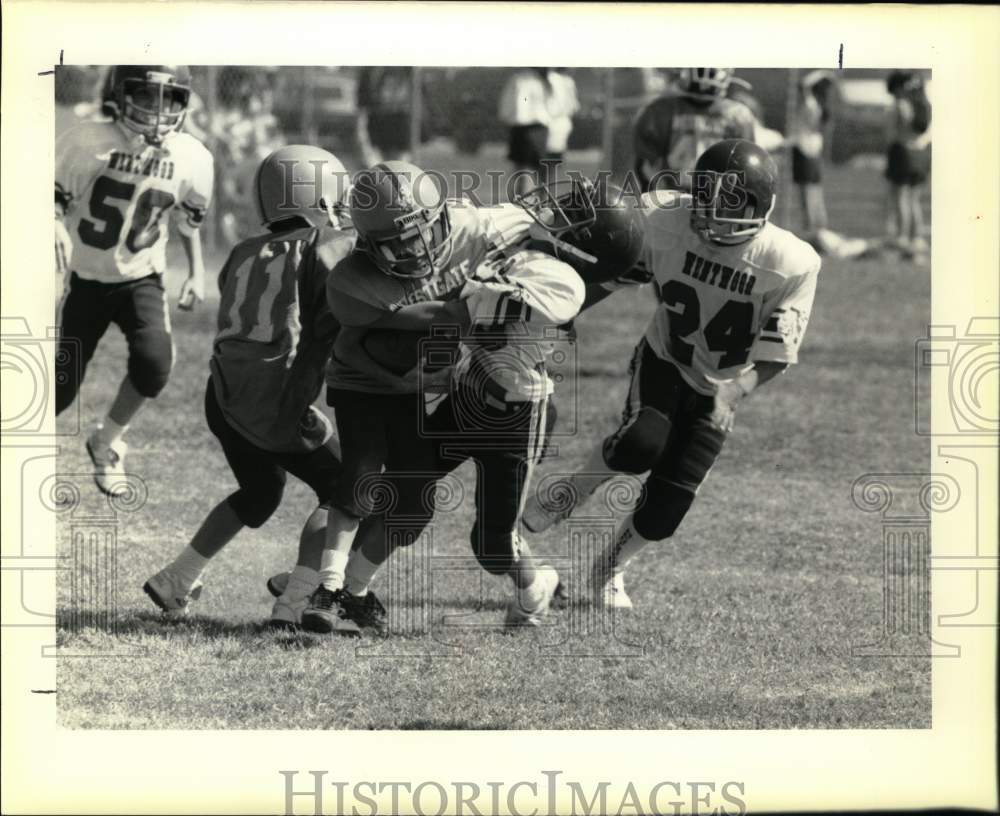 1989 Press Photo Jeremy Maroney tackled by Robbie Belken during Turkey Bowl- Historic Images