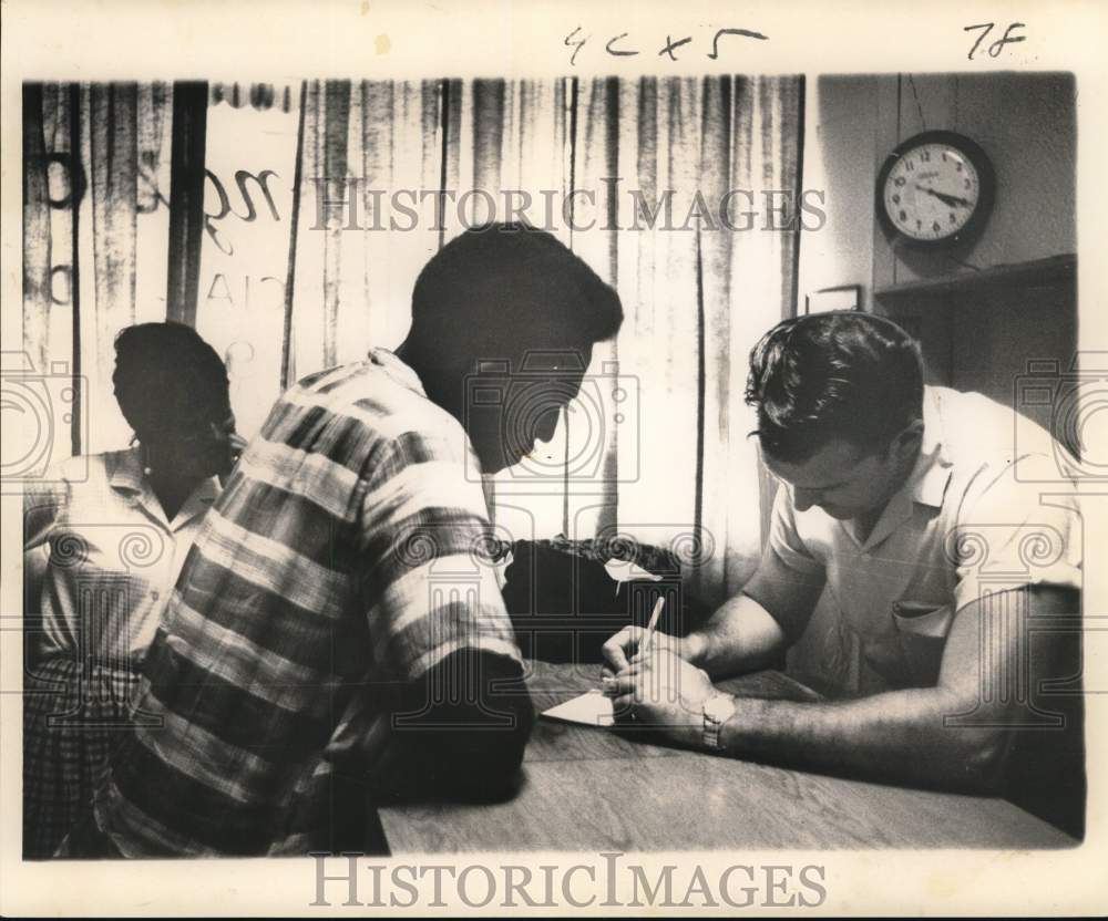 1964 Press Photo Couple received $55 for coat valued at $160 - noc58265