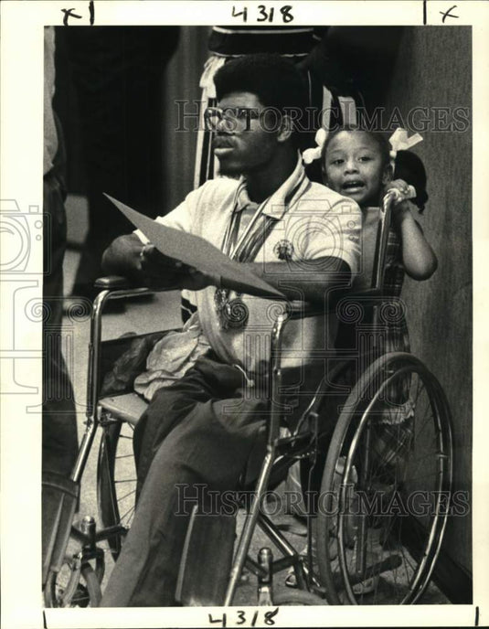 1982 Press Photo Phillip Sylves wears Olympic medals at Jefferson Parish council- Historic Images