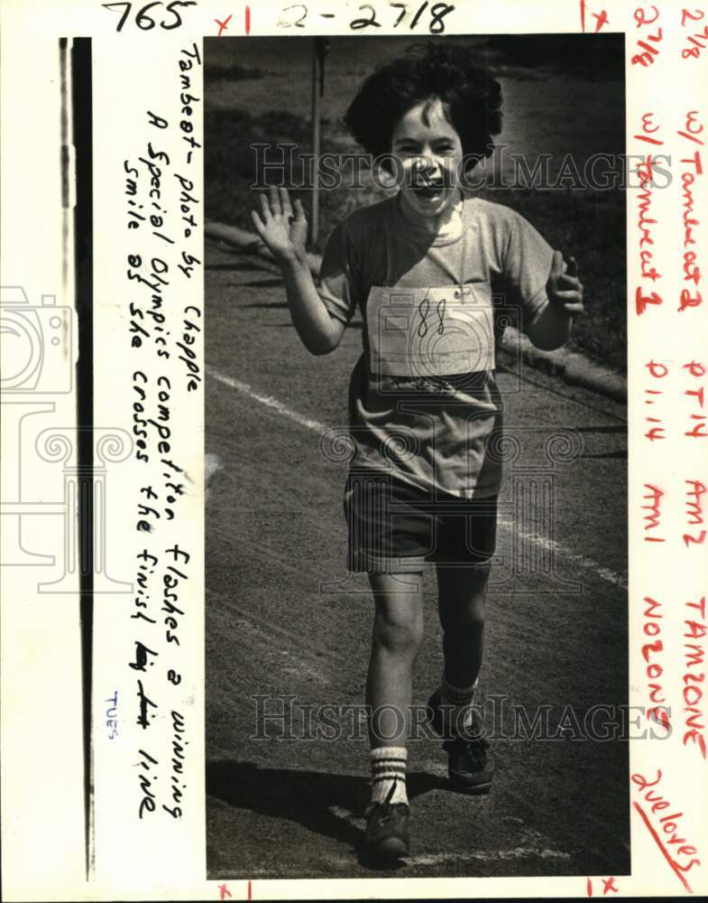 1981 Press Photo Special Olympics competitor crosses the finish line - noc63287- Historic Images