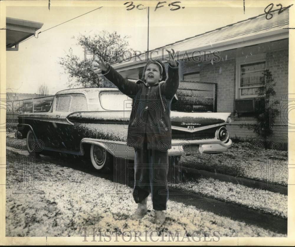 1960 Press Photo Joanne Marrone frolicks in the snow in New Orleans area