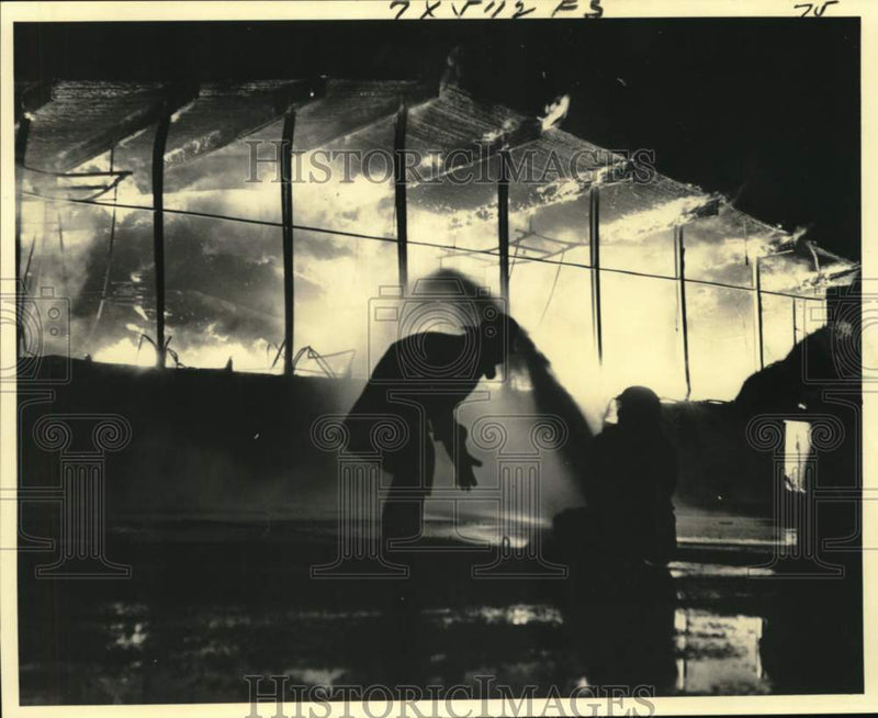 Load image into Gallery viewer, 1976 Press Photo Firemen Pump Water into the Slidell High School gymnasium
