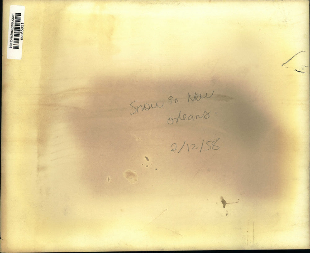 1958 Press Photo Teenagers playing in the snow-Snow in New Orleans - noc65931