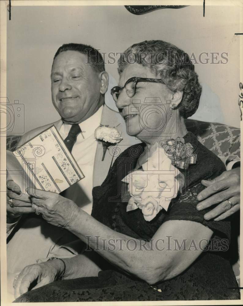 Load image into Gallery viewer, 1962 Press Photo Mr. and Mrs. Henry Stoll get cards on 50th wedding anniversary
