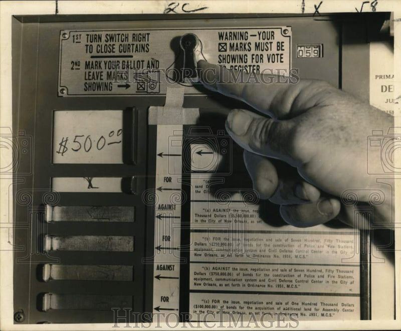 Load image into Gallery viewer, 1960 Press Photo Flip lever to end vote, open curtains- Voting Machine

