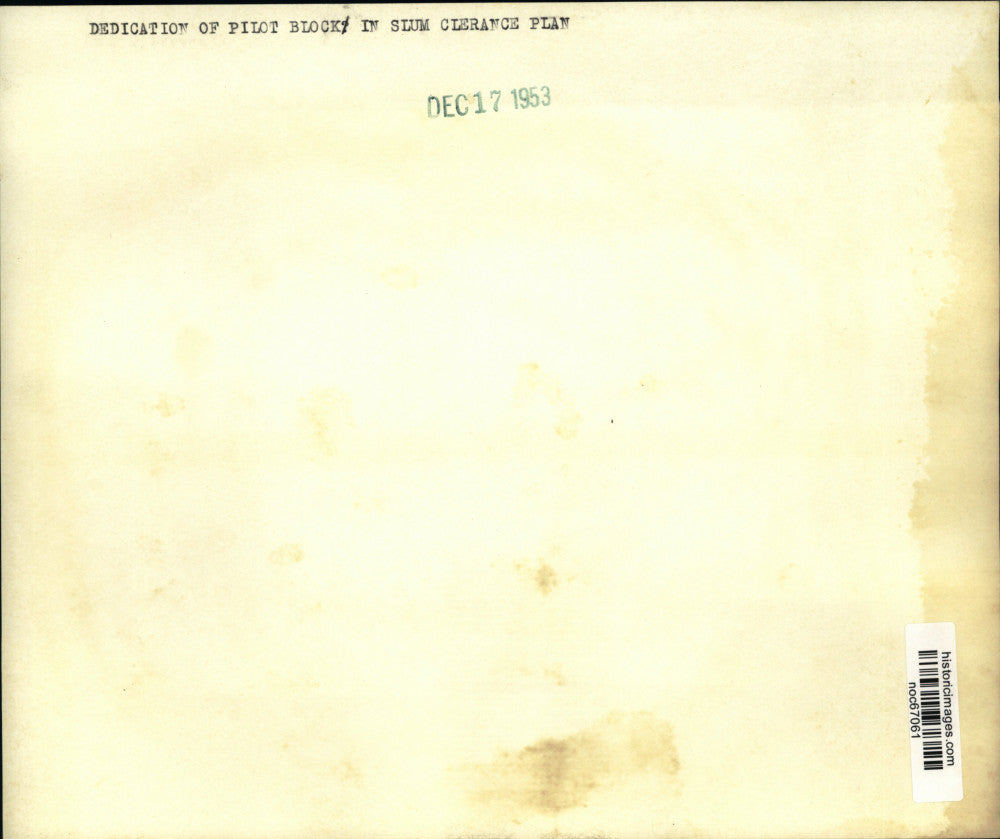 1953 Press Photo Dedication of Pilot area clock in slum clearance plan