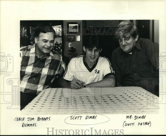 1985 Press Photo Scott Dimak signs with Rummel & his father - noc67991- Historic Images