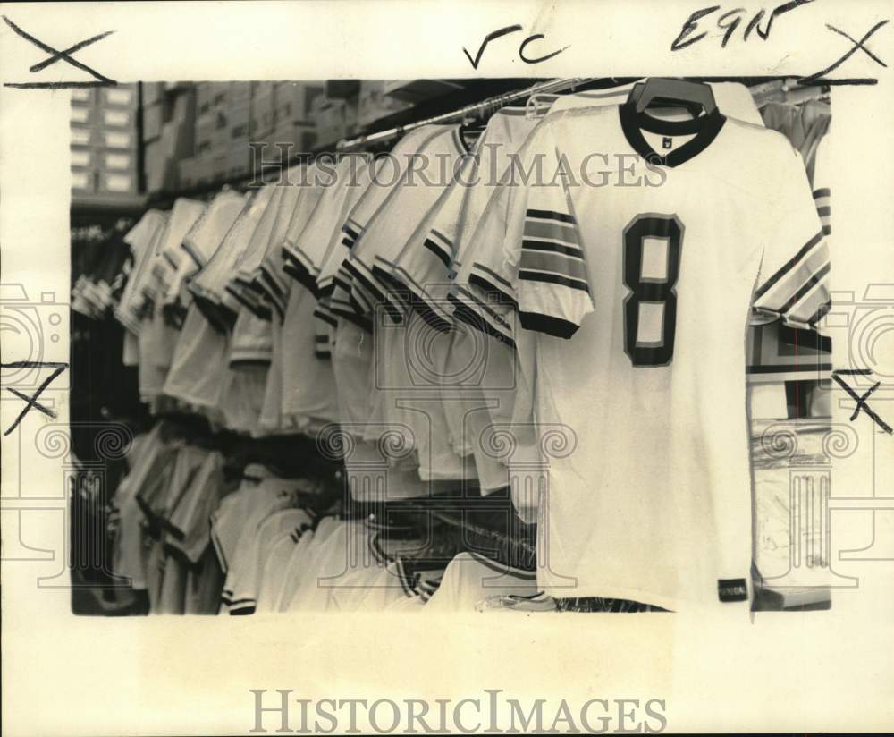 1975 Press Photo Tennis shirts available at Security Sporting Goods. - noc69254- Historic Images