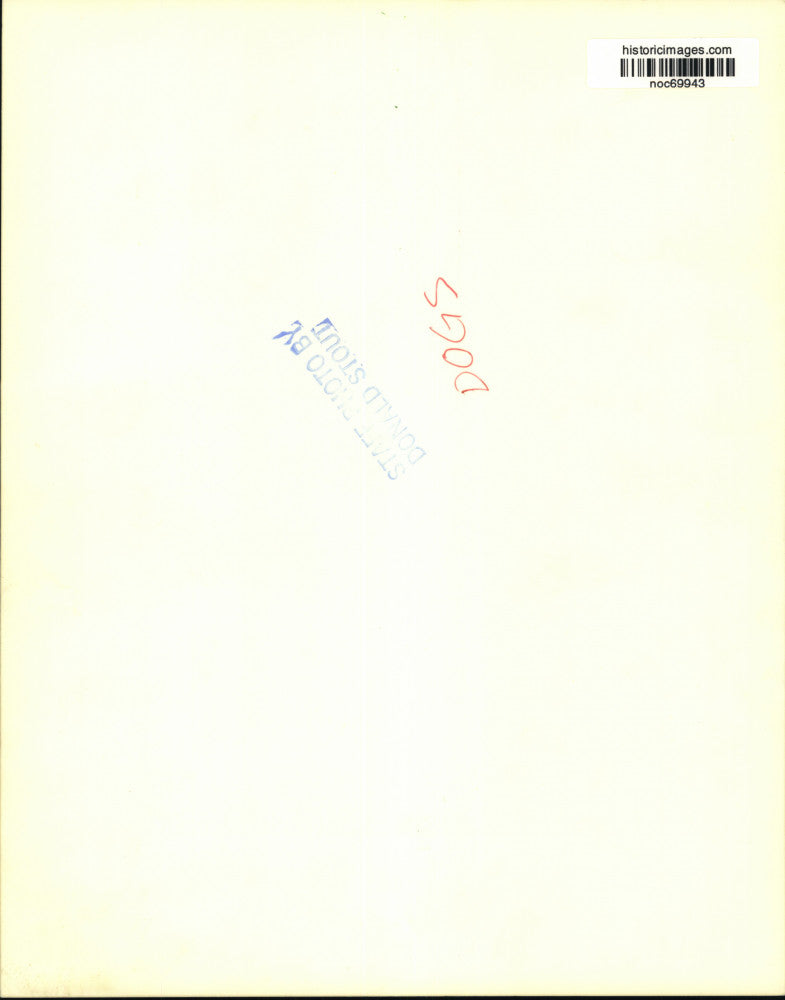 Press Photo A poodle playing in the part with his owner - noc69943