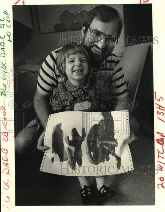 1987 Press Photo Gordon Stackel shows of his daughter Kayce's watercolor