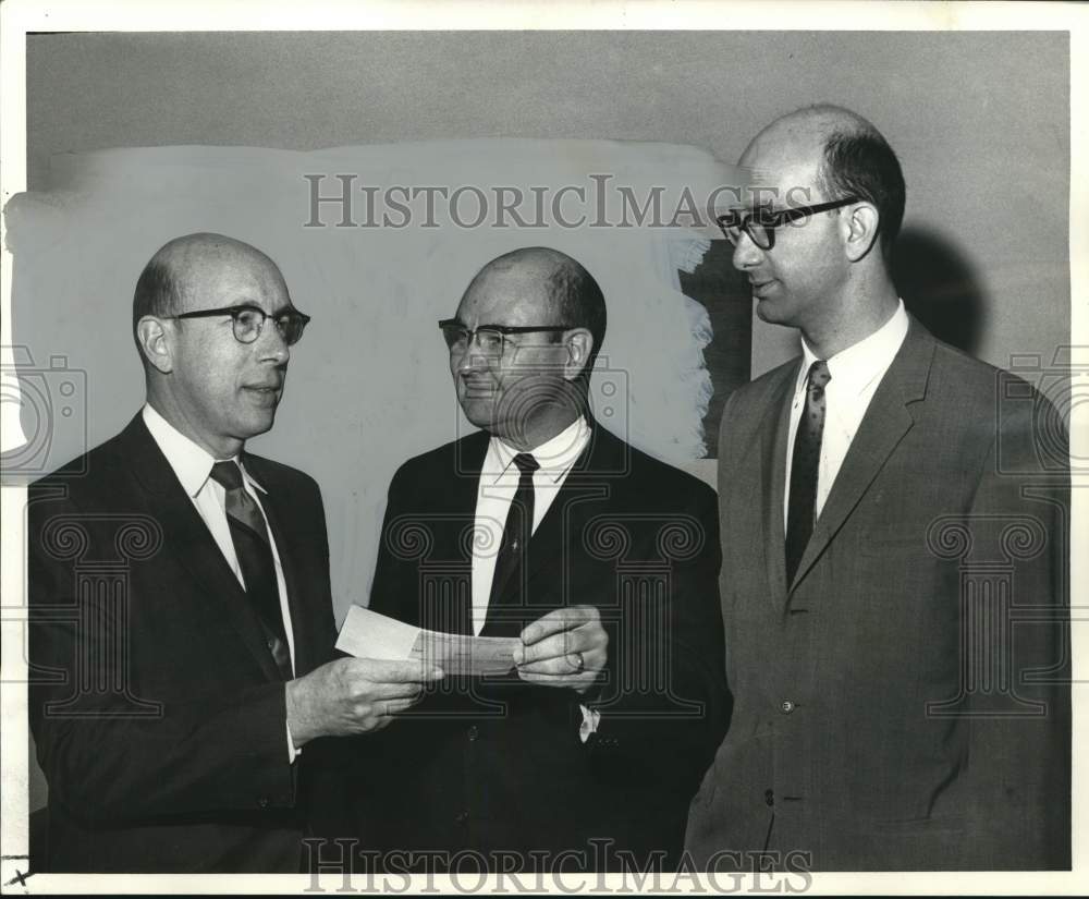 1968 Press Photo James W. Thokey presents check for Tulane University grant- Historic Images