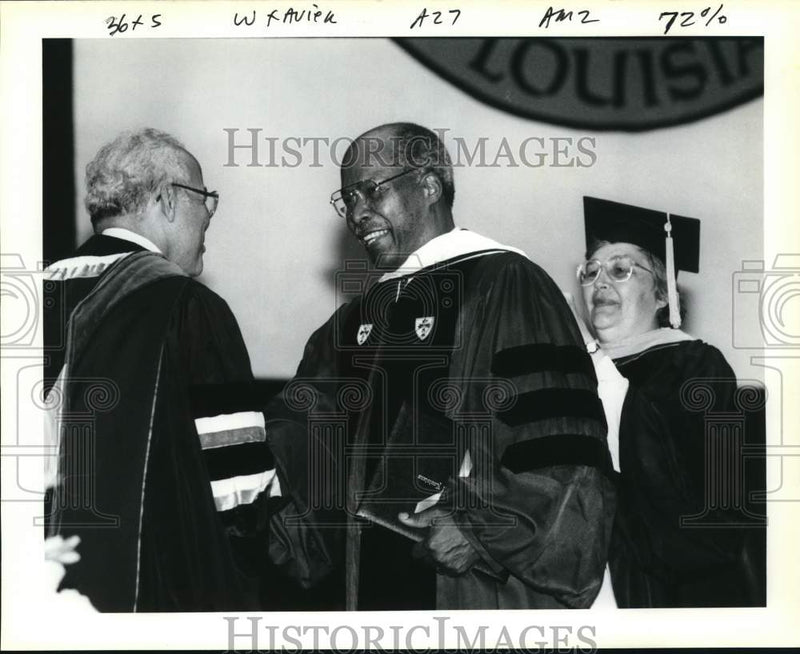 Load image into Gallery viewer, 1991 Press Photo Dr. Sullivan receives honorary degree Doctor of Humane Letters
