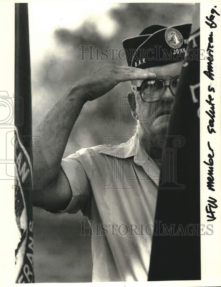 Load image into Gallery viewer, 1984 Press Photo Veterans of Foreign Wars Member salutes American Flag at Event
