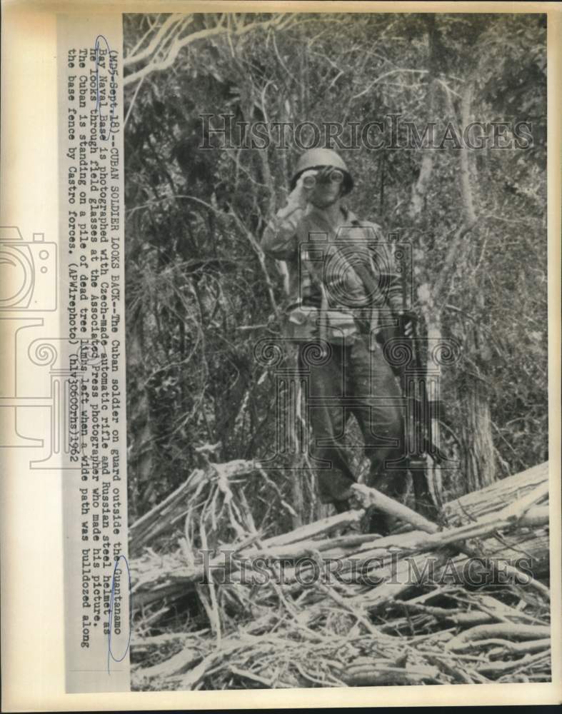 1962 Press Photo Cuban Soldier outside Guantanamo Bay Naval Base with Rifle- Historic Images