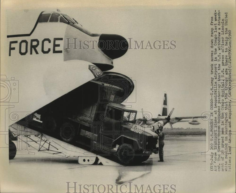 Load image into Gallery viewer, 1960 Press Photo U.S. Army Truck emerges from Air Force Transport Plane in Congo
