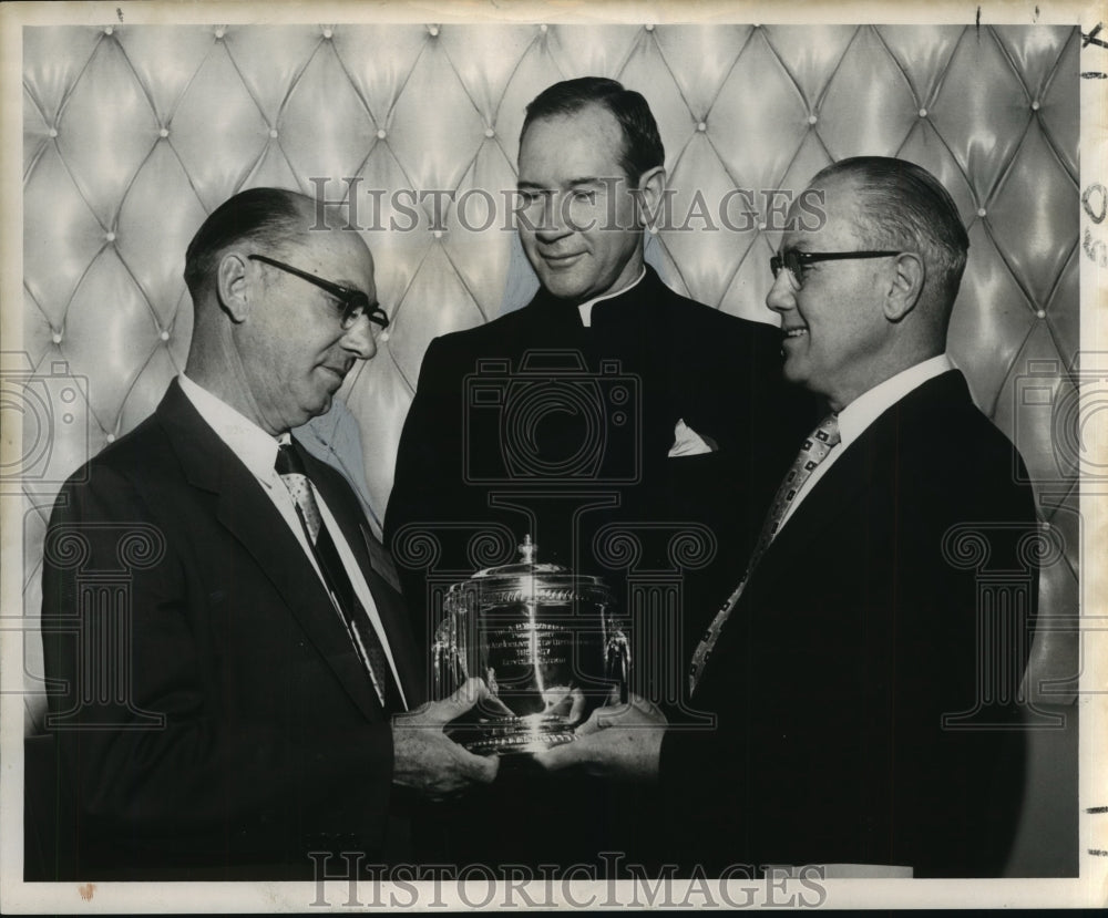 1955 Press Photo Dr. A.C. Broussard receives silver award Loyola Dental Alumni