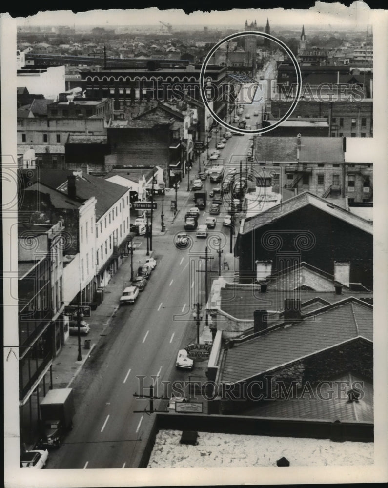 Load image into Gallery viewer, 1957 Press Photo Looking up at Busy Camp St. towards new ramp from Bridge
