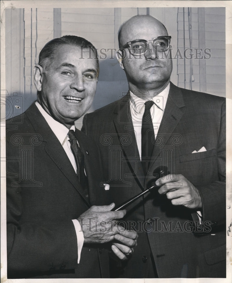 Load image into Gallery viewer, 1968 Press Photo Ernest A. Carrere Junior, is congratulated by George J. Riehl
