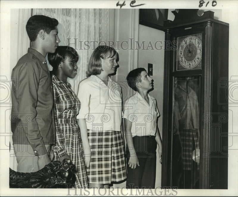 Load image into Gallery viewer, 1967 Press Photo S.J..Peters Students Watch Clock, Ponder Curfew, New Orleans
