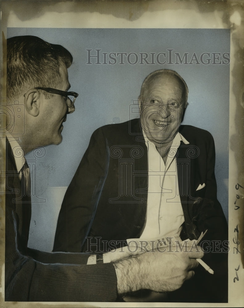 Load image into Gallery viewer, 1966 Press Photo Narcissus Culos smiles as Frank Ticheli reads news story
