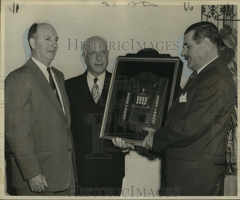 Load image into Gallery viewer, 1954 Press Photo Awarding trophy, Real Estate Board of New Orleans to J. Hirsch
