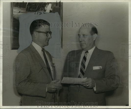 1958 Press Photo District sales manager E.J. Lacombe with Carl Couvillon