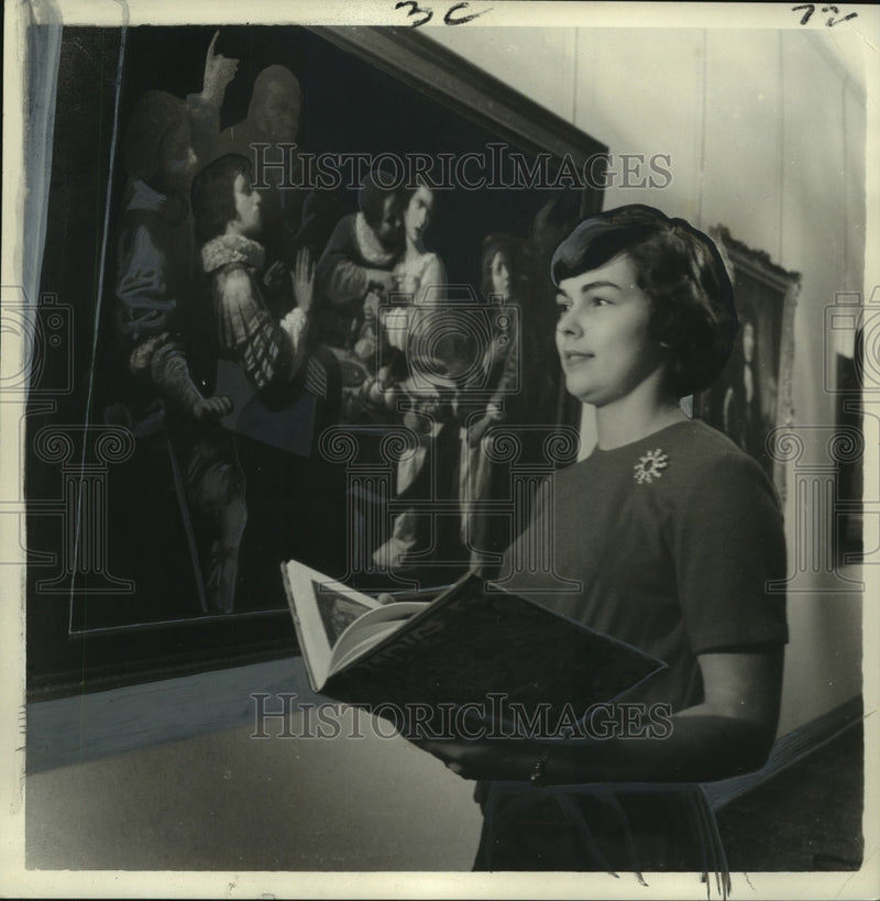 Load image into Gallery viewer, 1964 Press Photo Susan Anne Landry admires Memento Mori painting - noo09711
