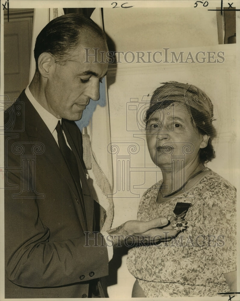 Load image into Gallery viewer, 1964 Press Photo Mrs. Simone Delery receives the French Legion of Honor
