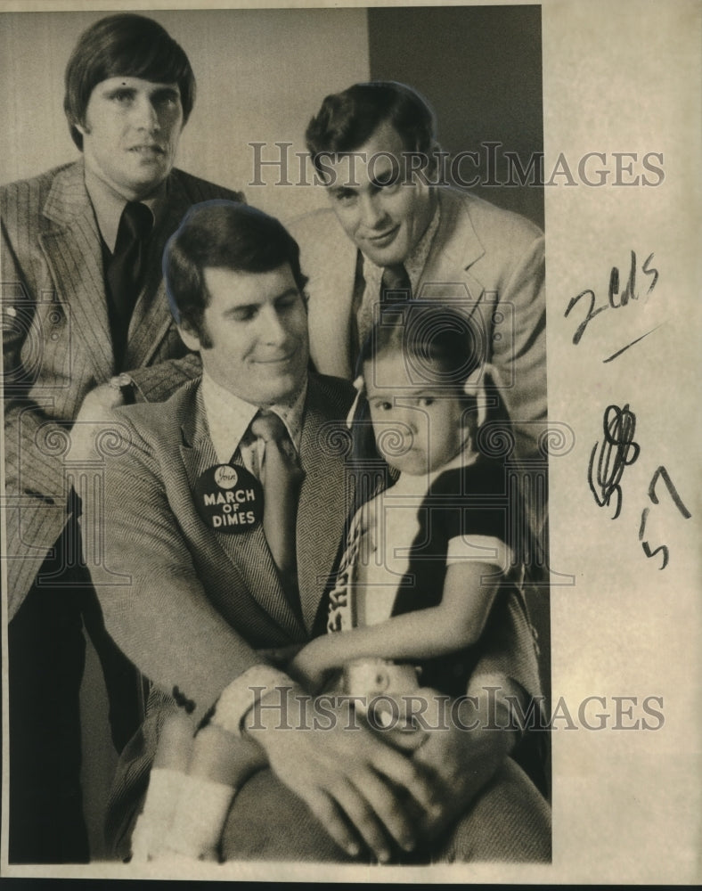 Load image into Gallery viewer, 1972 Press Photo Carmen Donesa March of Dimes Child with Saints Football Players
