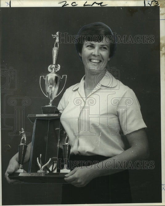 1969 Press Photo Miss Judy Dufrene, Spark softball team, holds team's trophy