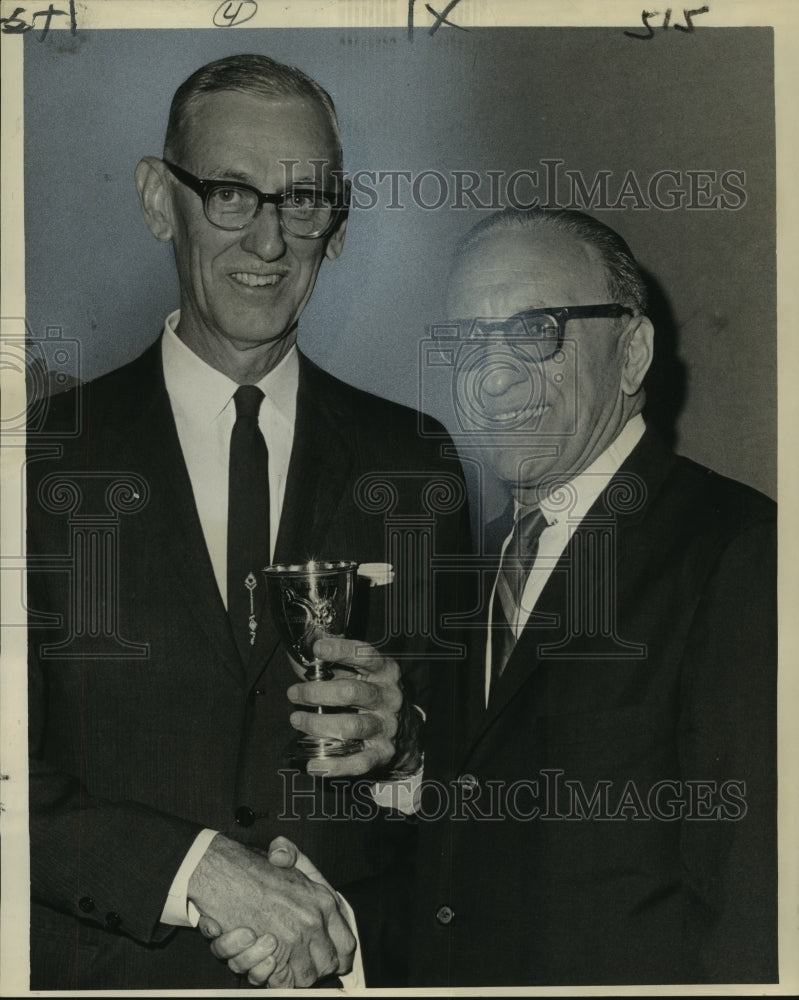 1963 Press Photo Lawrence J. Dumestre shows trophy - improvement historic area
