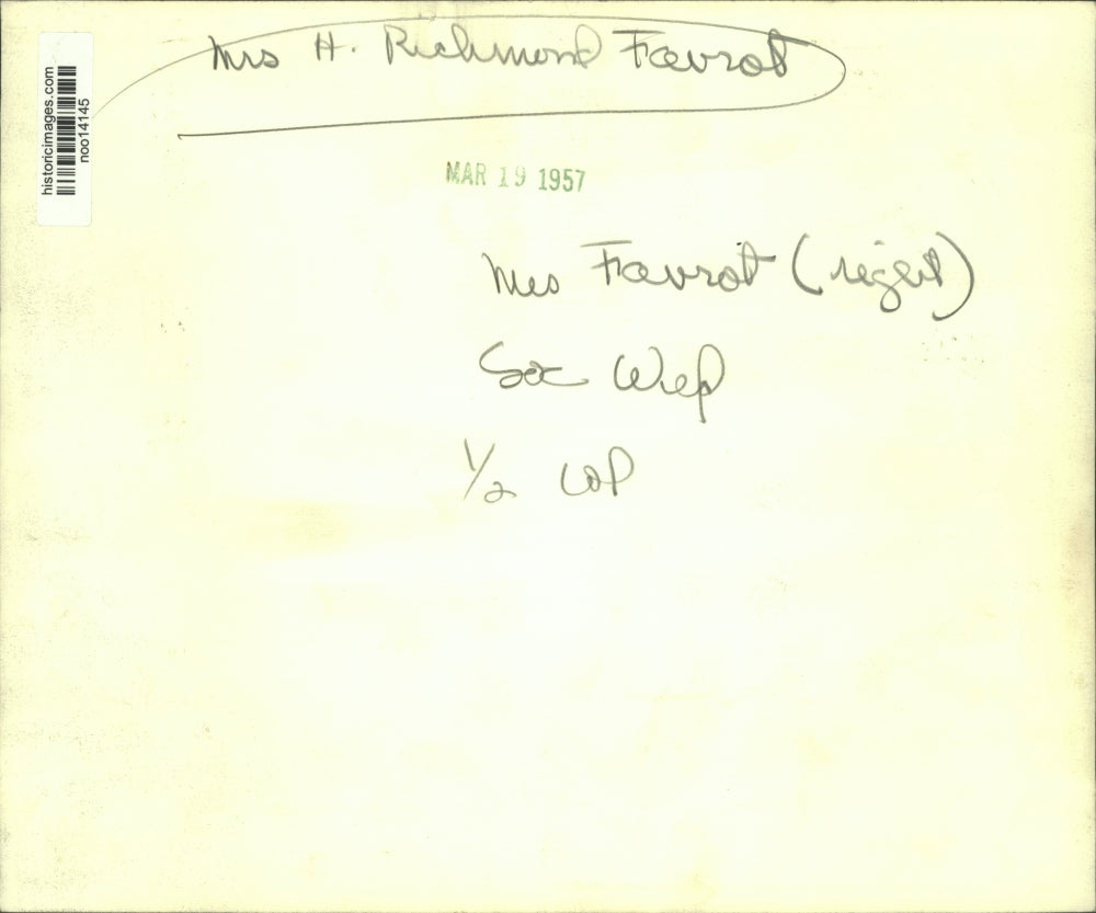 1957 Press Photo Mrs. H. Richmond Favrot with another holding miniature cannon