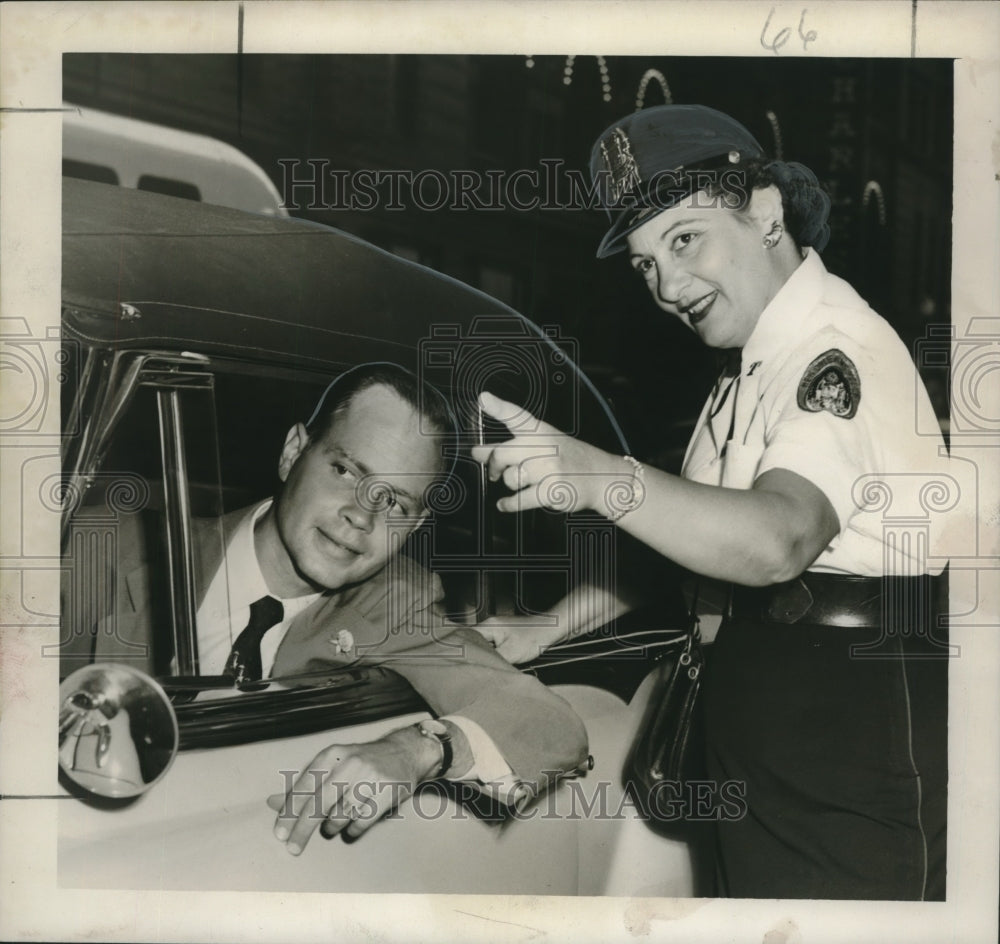 1955 Press Photo Policewoman Frances Fedele gives directions to James Plaunche