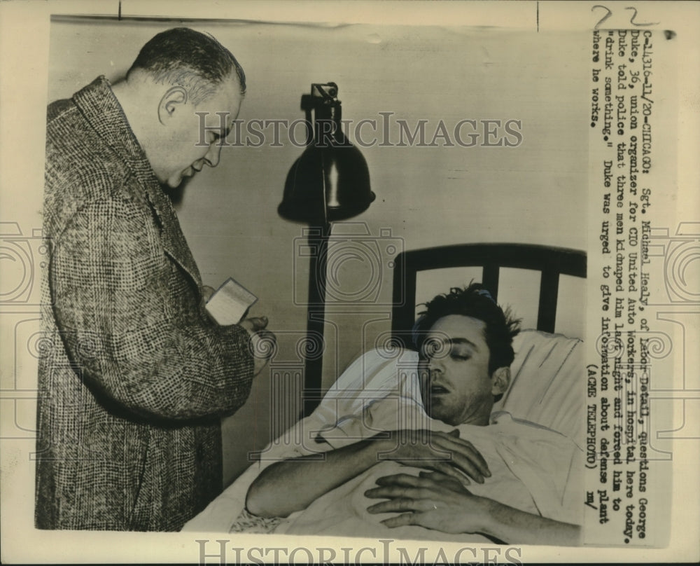 1951 Press Photo George Duke, union organizer, in hospital bed being interviewed