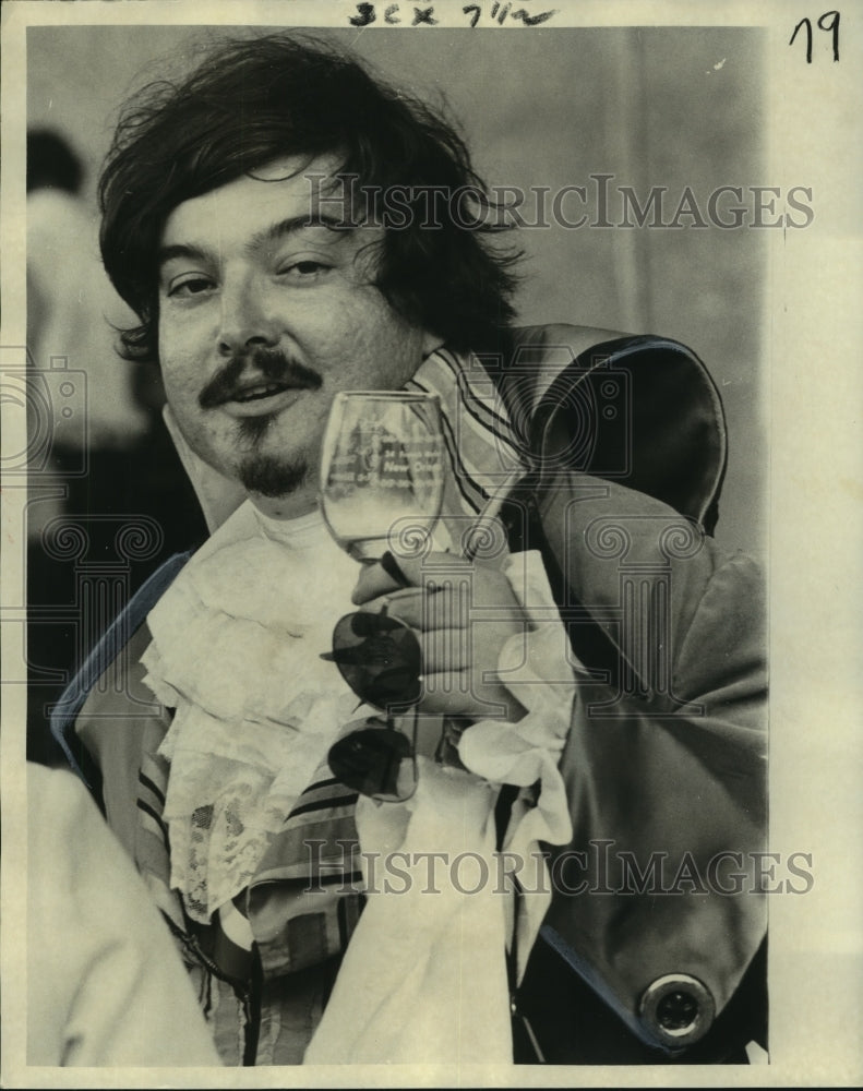 1975 Press Photo Bastille Day Costume Contestant Toasts, New Orleans- Historic Images