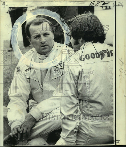 1973 Press Photo Car Racers A.J. Foyt, Lee Kunsman in Indianapolis Speedway Pit- Historic Images