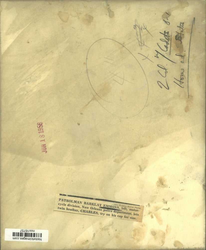 1956 Press Photo Patrolman Barklay Emmons Puts Hat On His Brother, Charles