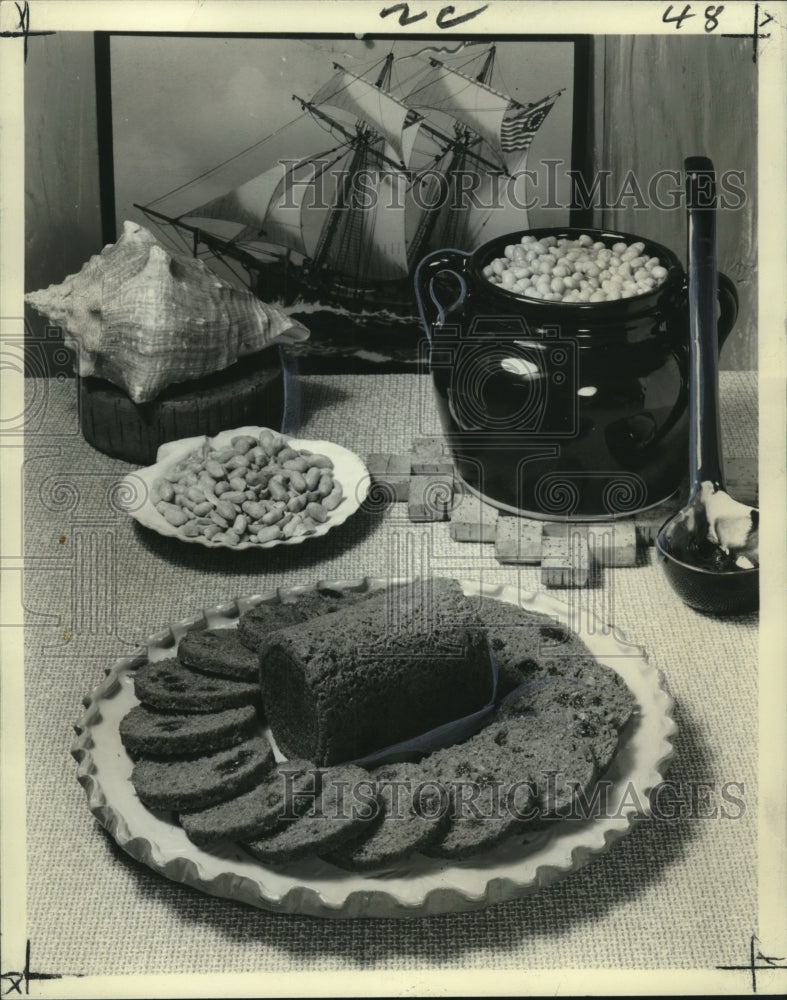  Press Photo Boston Baked Beans served with fruitcake and a dish of peanuts- Historic Images