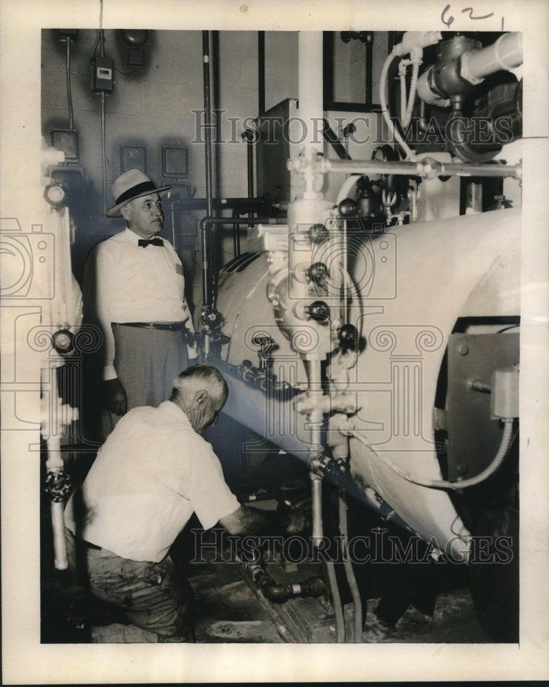 Load image into Gallery viewer, 1956 Press Photo Albert Frey &amp; maintenance man Emile Robichaux checks the boiler

