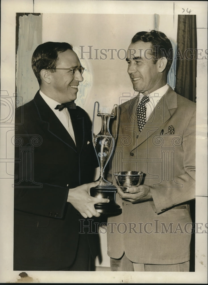 Load image into Gallery viewer, 1951 Press Photo Oswald Frey receives the Rodeo hooks winner's cup - noo17918
