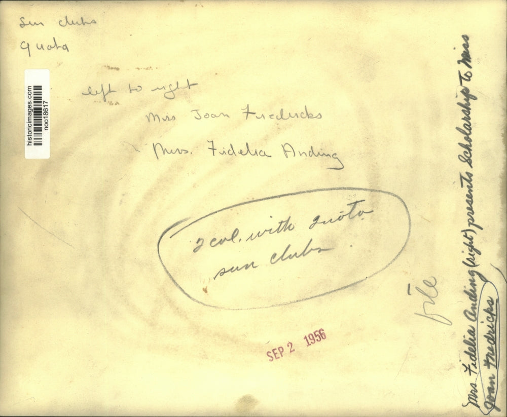 1956 Press Photo Mrs Fidelia Anding presents scholarship to Miss Joan Fredericks