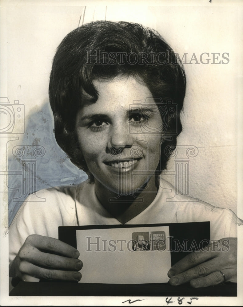 Load image into Gallery viewer, 1971 Press Photo Mrs. Karole Fulton R.N.B.S.N. holds postage stamp post card
