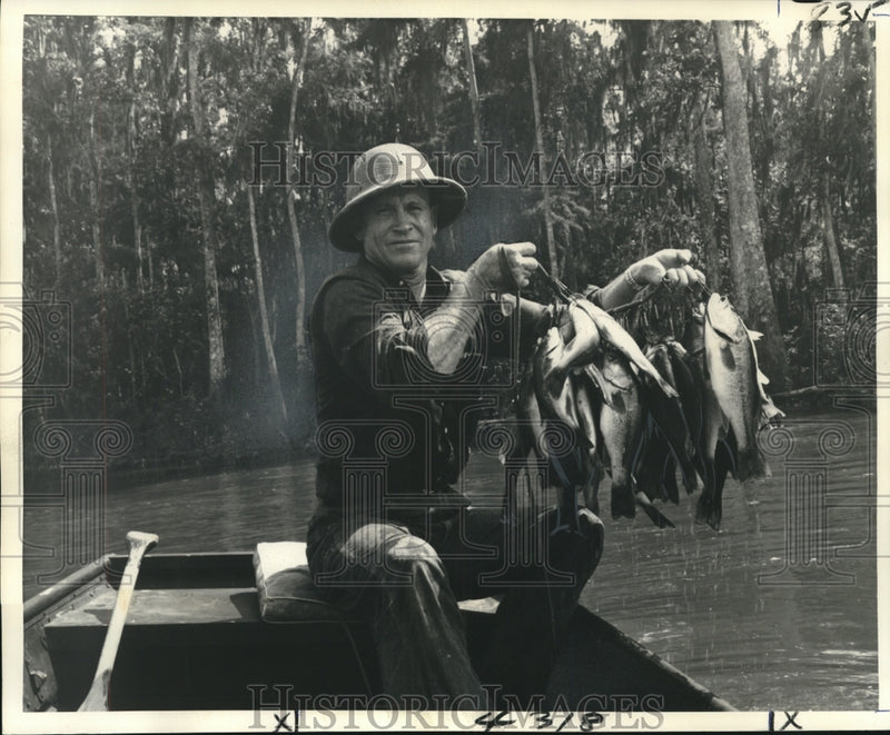 Load image into Gallery viewer, 1977 Press Photo Bass fishing in the bayous of Louisiana - noo19384
