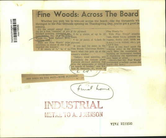 1956 Press Photo Gerrie Faia examines a wood paneling at the Fine Woods Company
