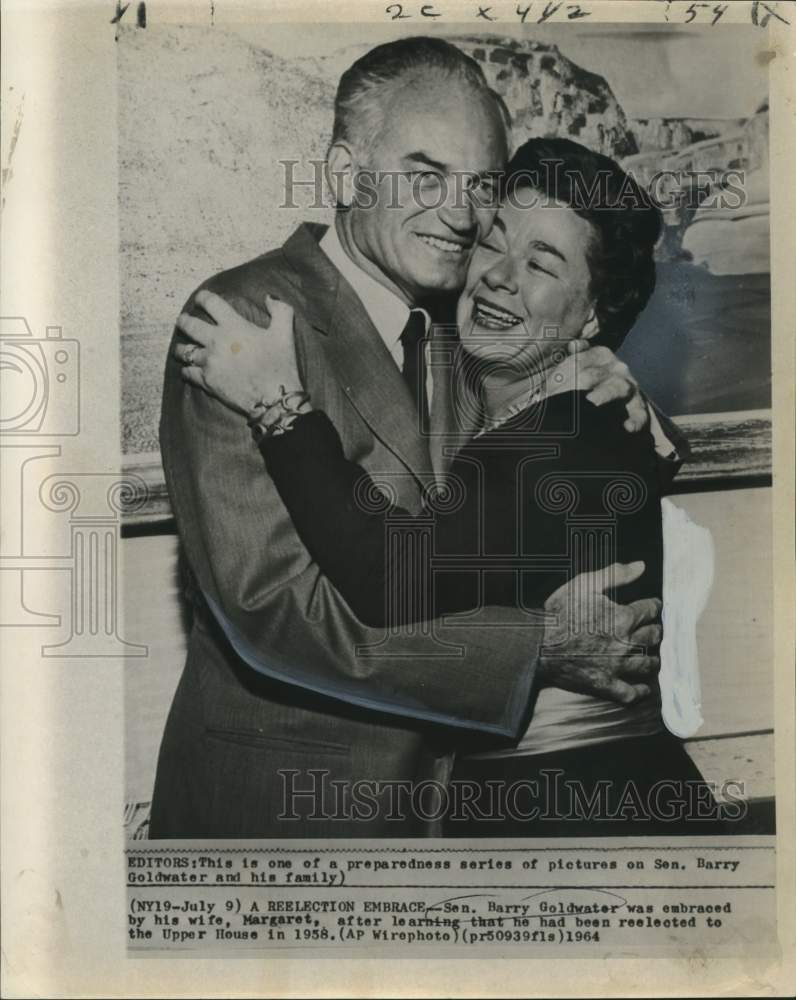 Load image into Gallery viewer, 1958 Press Photo Senator Barry Goldwater and wife, Margaret, after reelection
