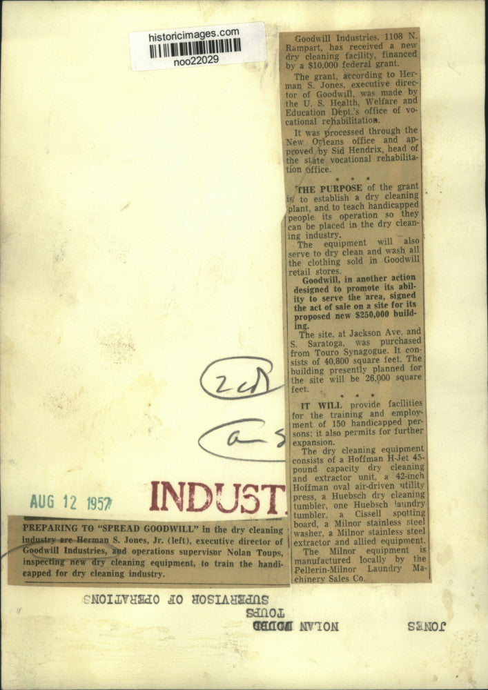 1957 Press Photo Herman S. Jones Junior, Goodwill Industries, Dry Cleaning