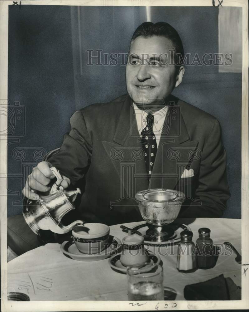 1950 Press Photo Robert P. Gerholz Pouring Coffee - noo22130