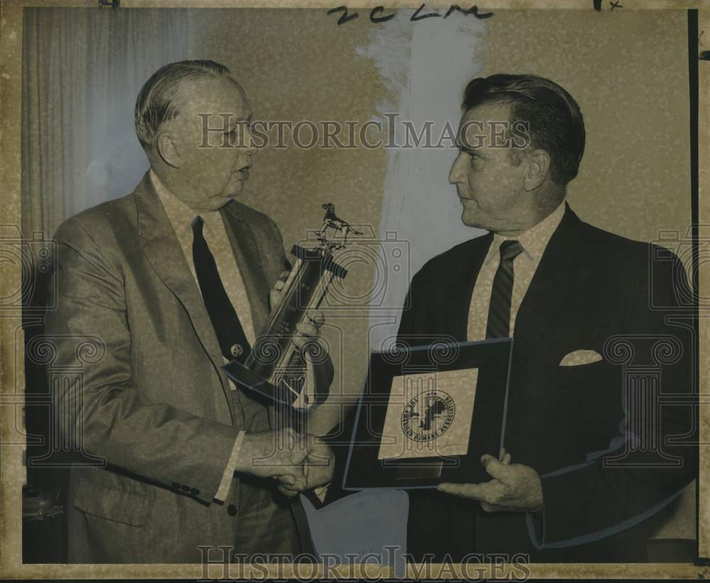 1968 Press Photo Captain Roy J. Hamann receives award for poodle rescue