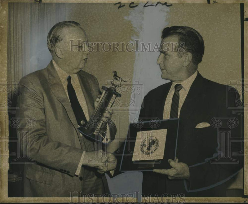 Load image into Gallery viewer, 1968 Press Photo Captain Roy J. Hamann receives award for poodle rescue
