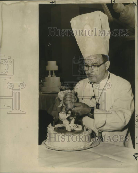 1960 Press Photo Icing Artist Emil Hilbert Works on Cake - noo30512